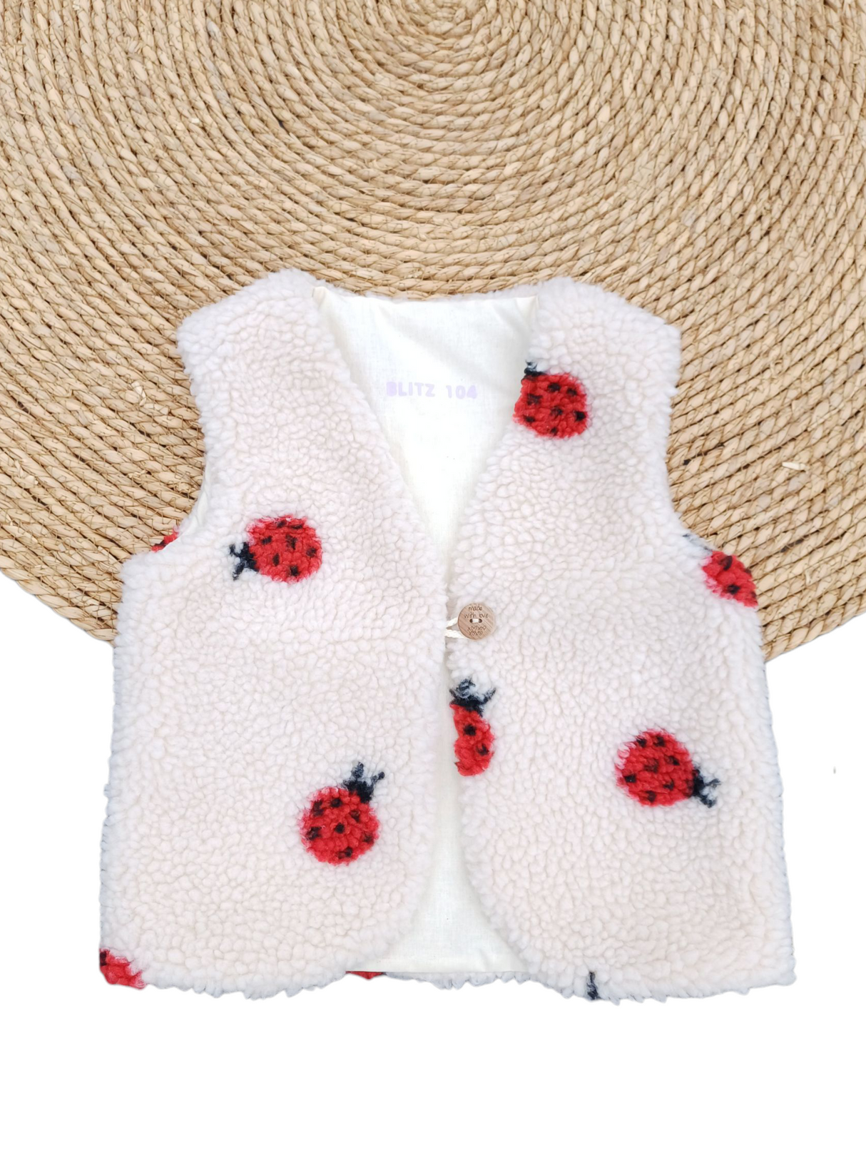 Gilet teddy lieveheersbeestje