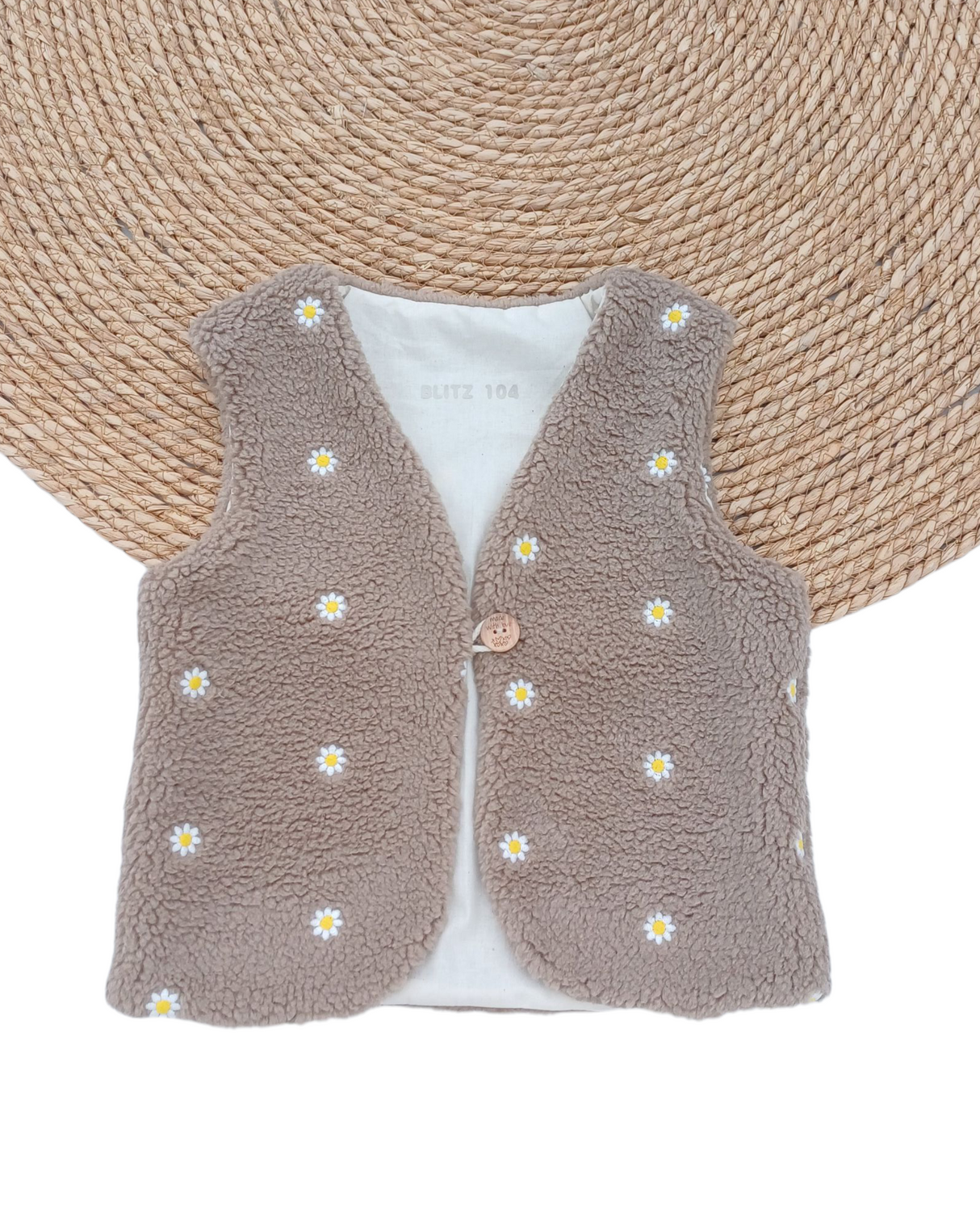 Gilet teddy bruin met madeliefjes