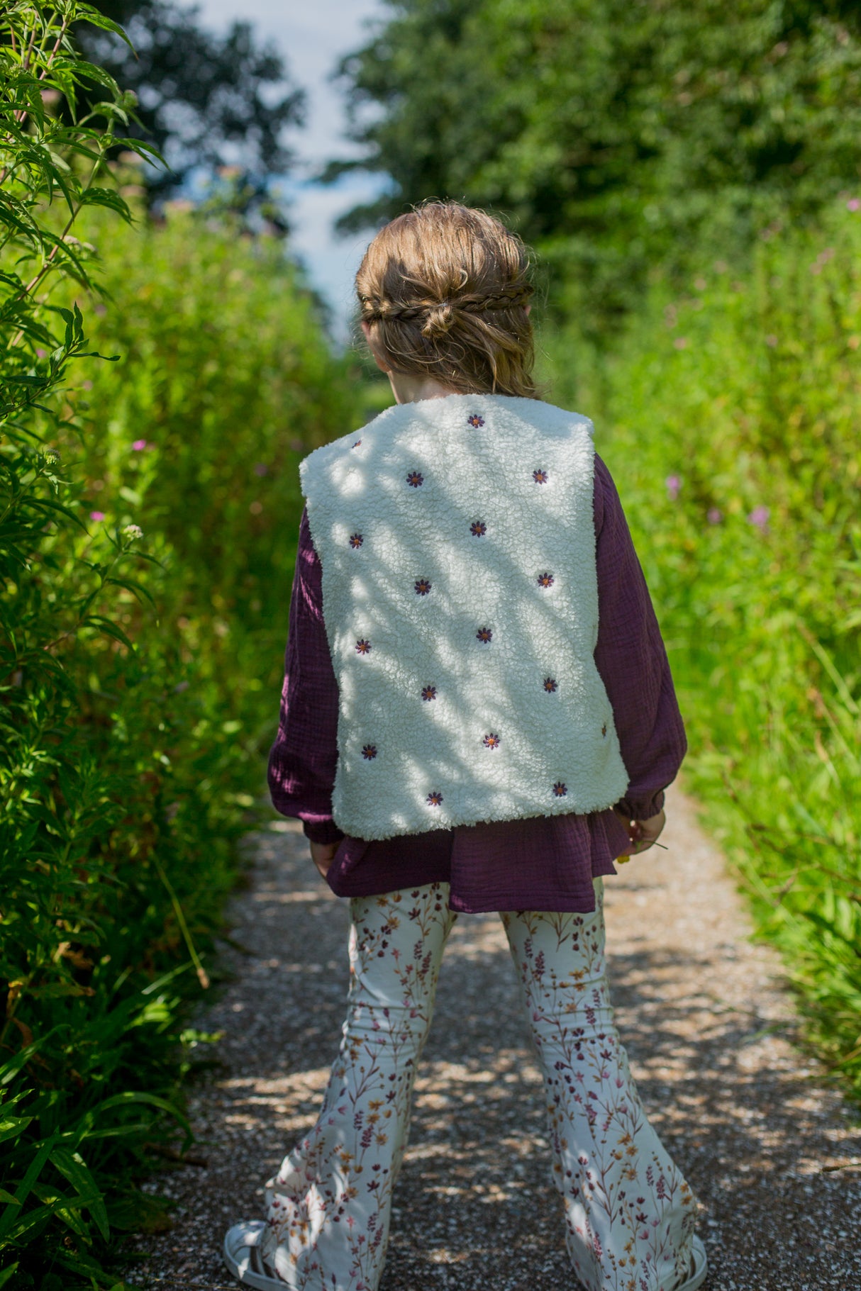 Gilet teddy geborduurde bloem
