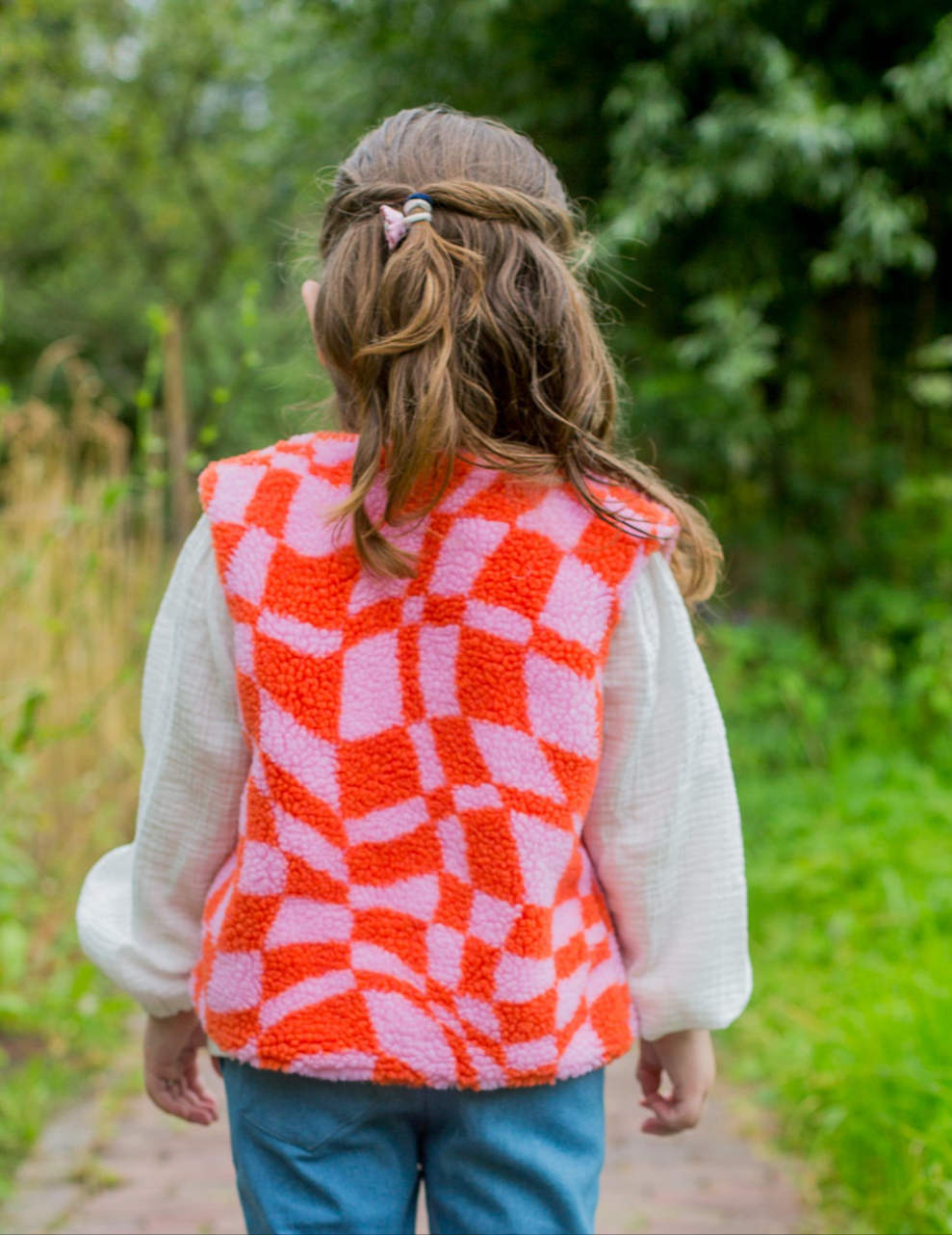 Gilet teddy graphic oranje/roze