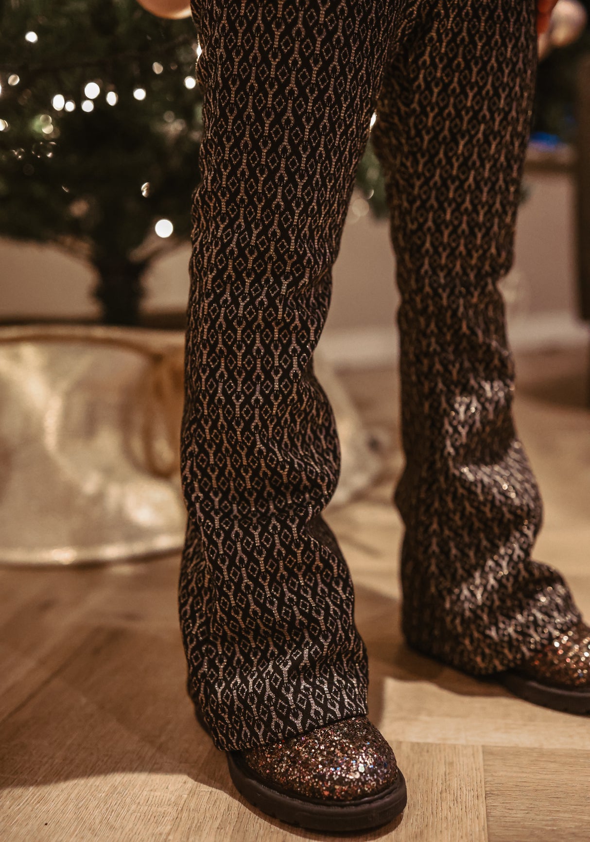 Flared broek zwart/goud met glitter