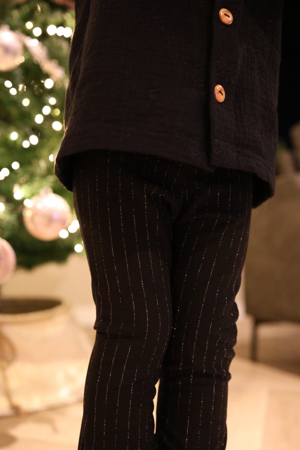 Flared broek zwart glitter streepje