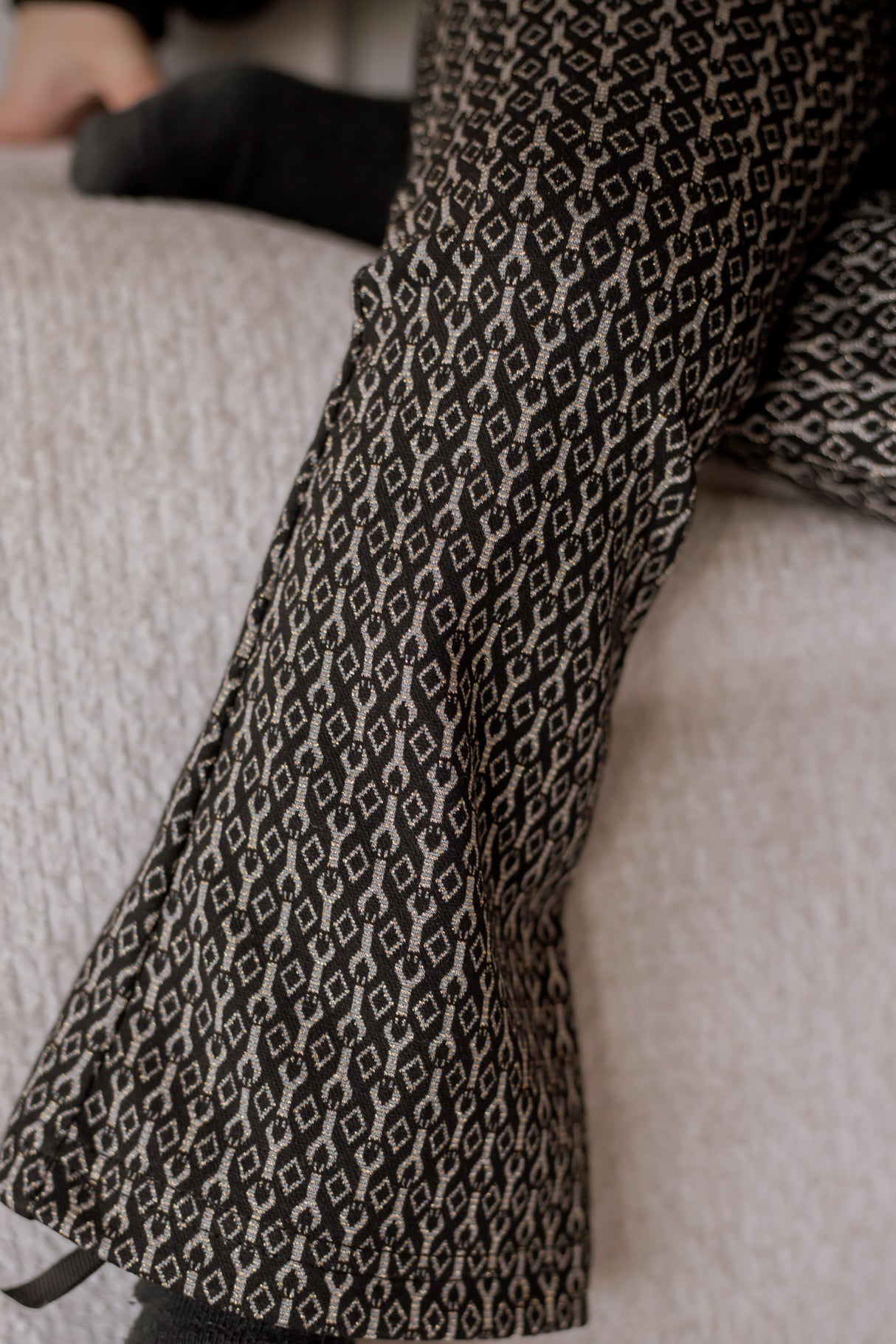 Flared broek zwart/goud met glitter