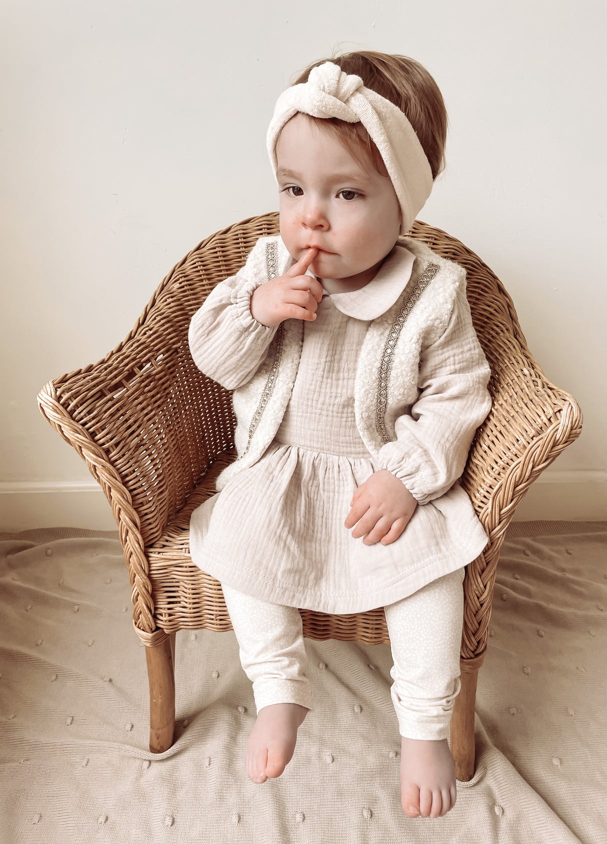 Gilet boucle met sierband