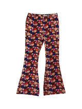 Flared broek happy floral (op zwart)